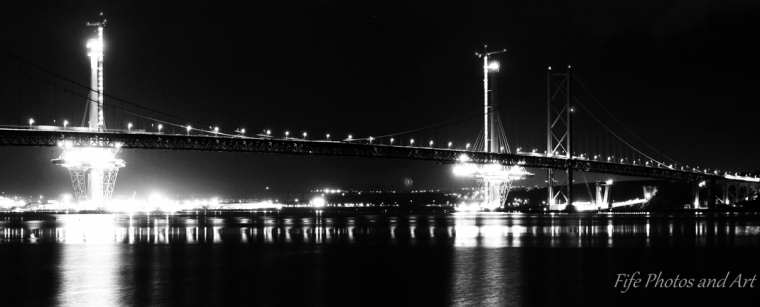 Forth Old and New Road Bridge at night from South Queensferrry