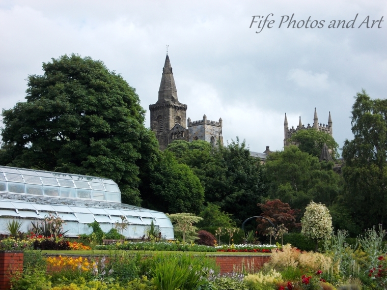 Greenhouse in Pittencrieff Park, with Dunfermline Abbey in background.