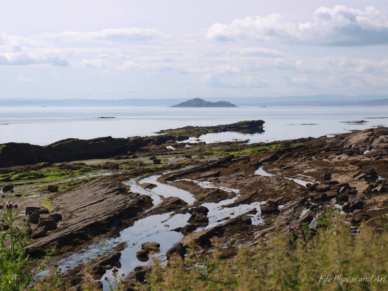 View across the Firth of Forth, from Seafield Castle Beach, Kirkcaldy with Lower Limestone Formation in foreground